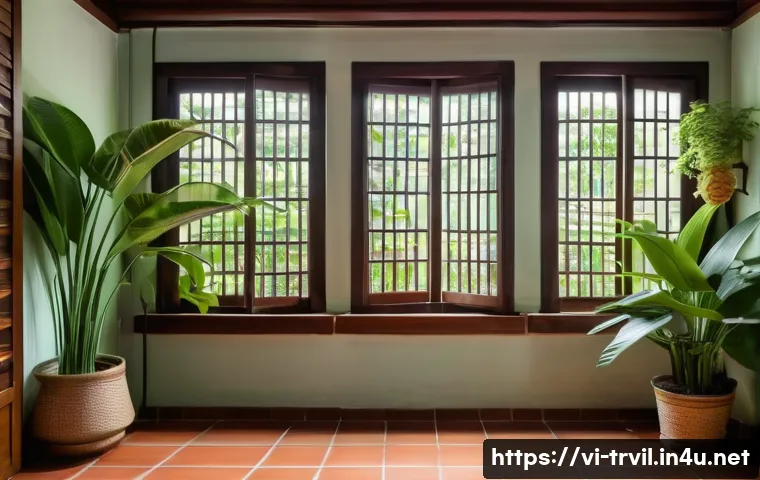 전통주택의 통풍 시스템 - A traditional Vietnamese house interior featuring large opposing windows with adjustable wooden shut...